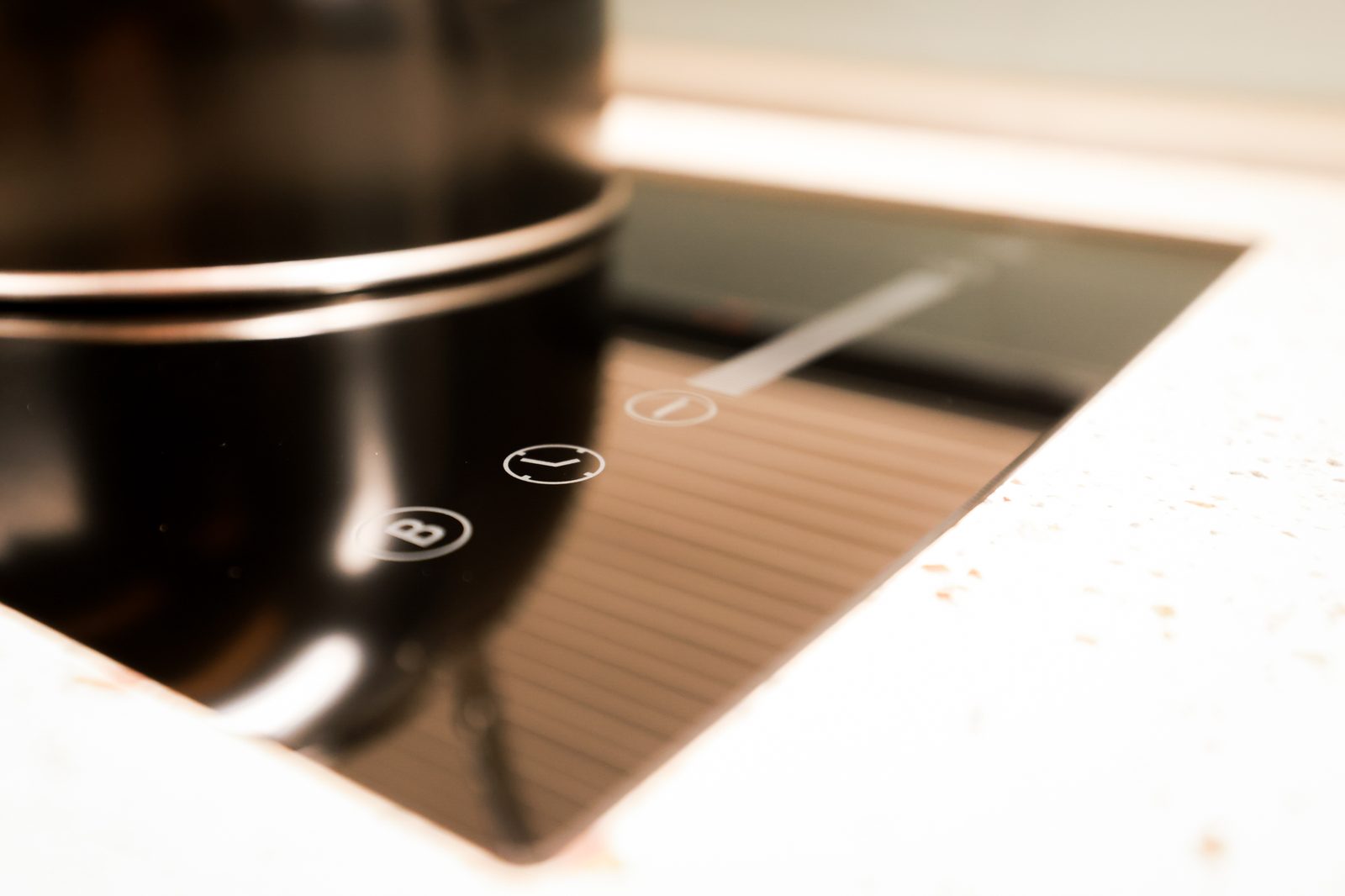 Integrated induction cooking area