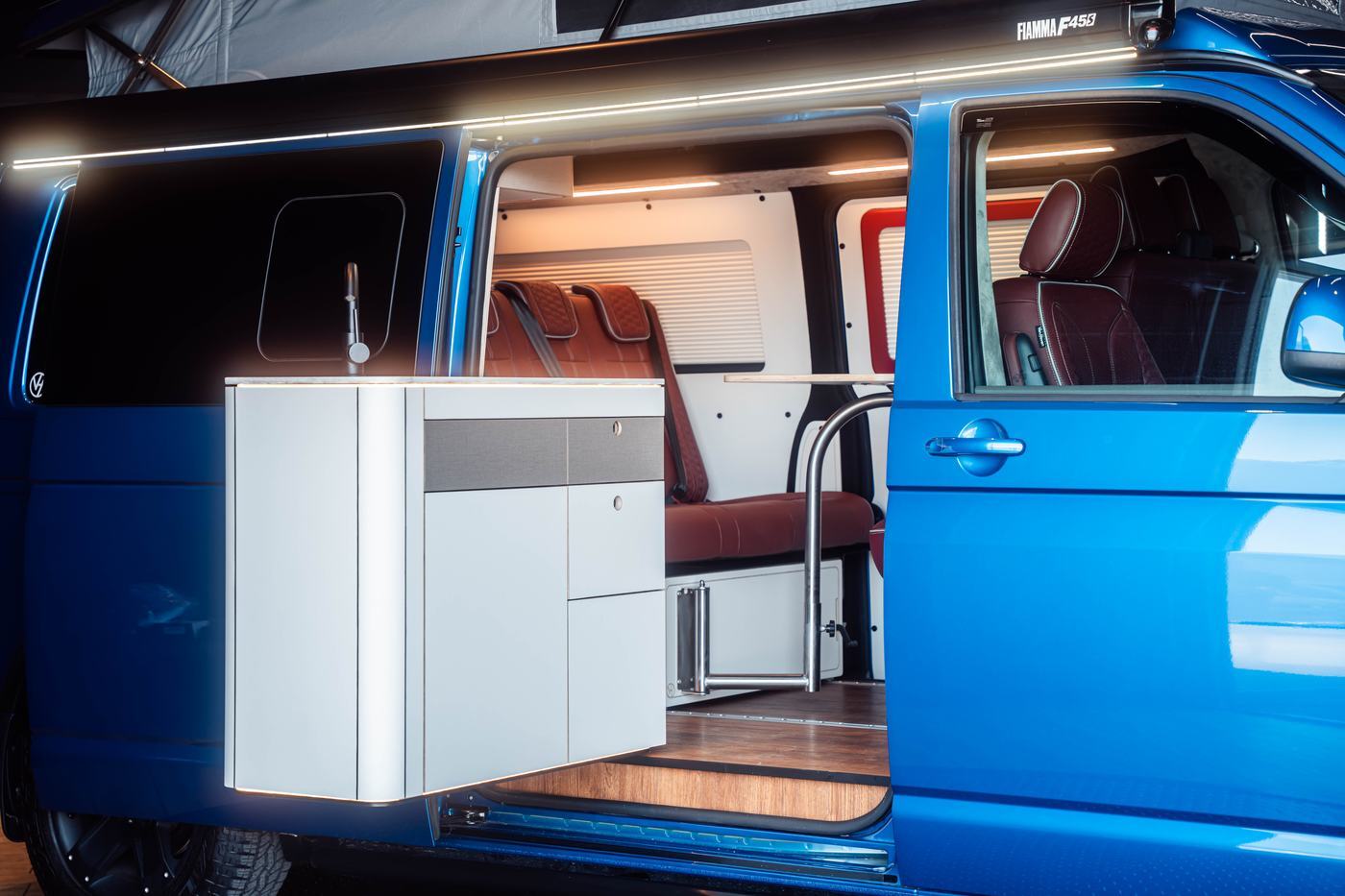Side door open on a Van Haven build, kitchen pod and rear seating