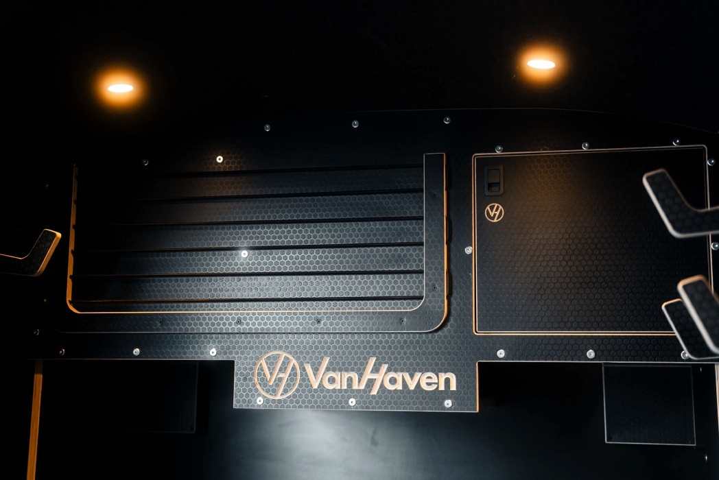 Van Haven T7 branded honeycomb wall panel with downlights